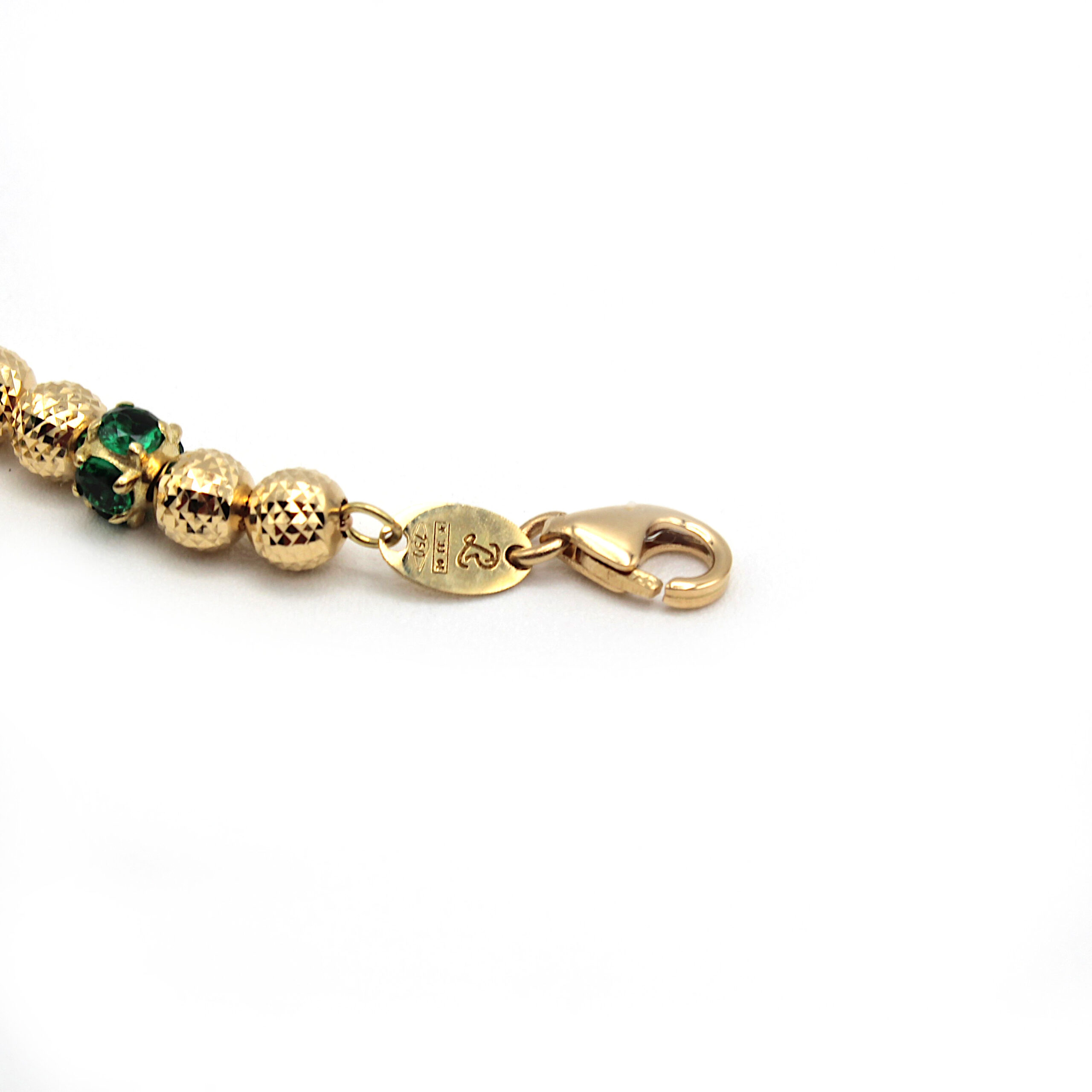 Bracciale_oro_milleluci_pietre_verdi_chiusura