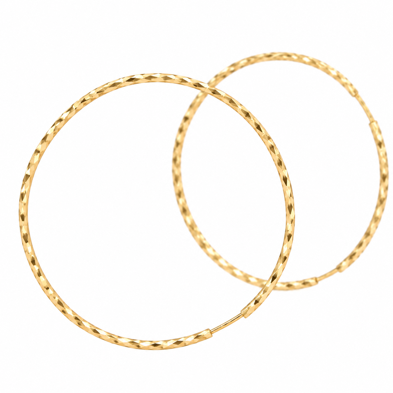 dettaglio_lavorazione_diamantata_orecchini_cerchio_oro_18kt
